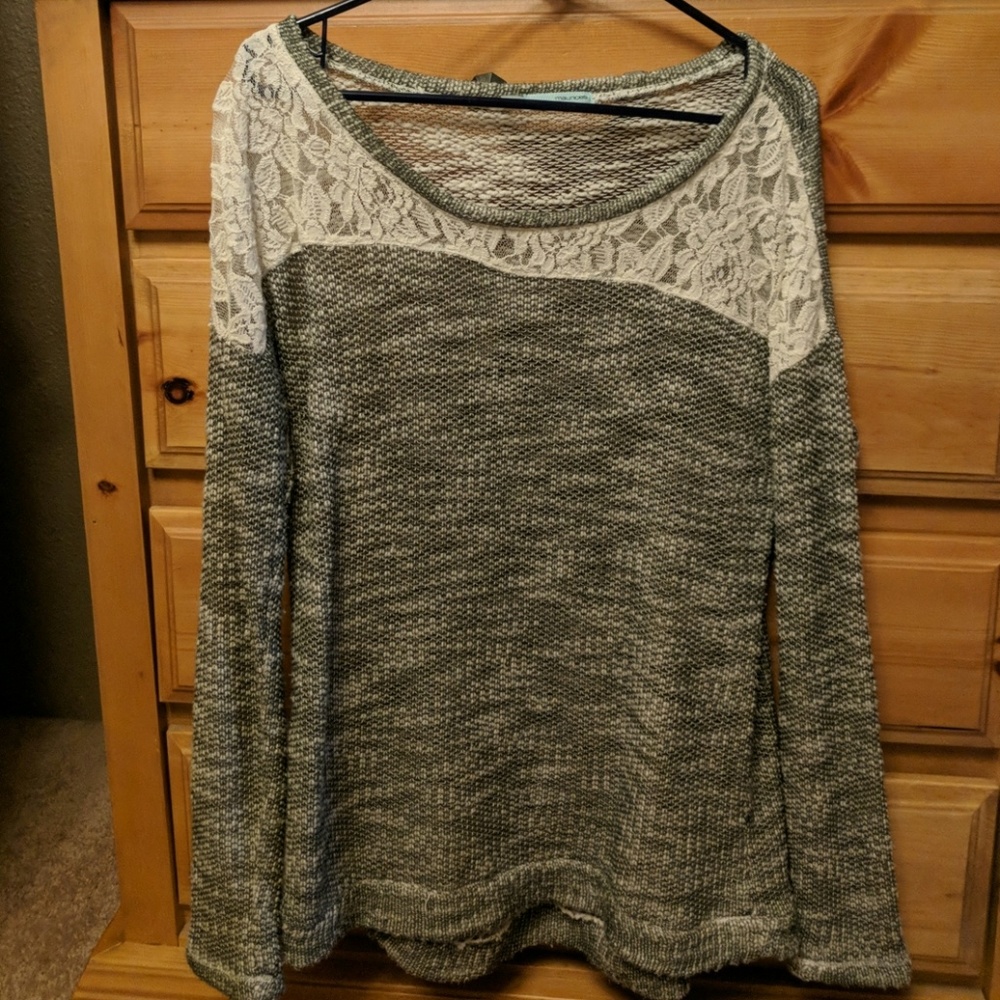 Maurice's green sweater